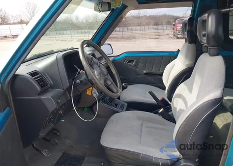 1993 Suzuki Sidekick Js z USA, uszkodzony, nr VIN 2S3TC01C7P6406115